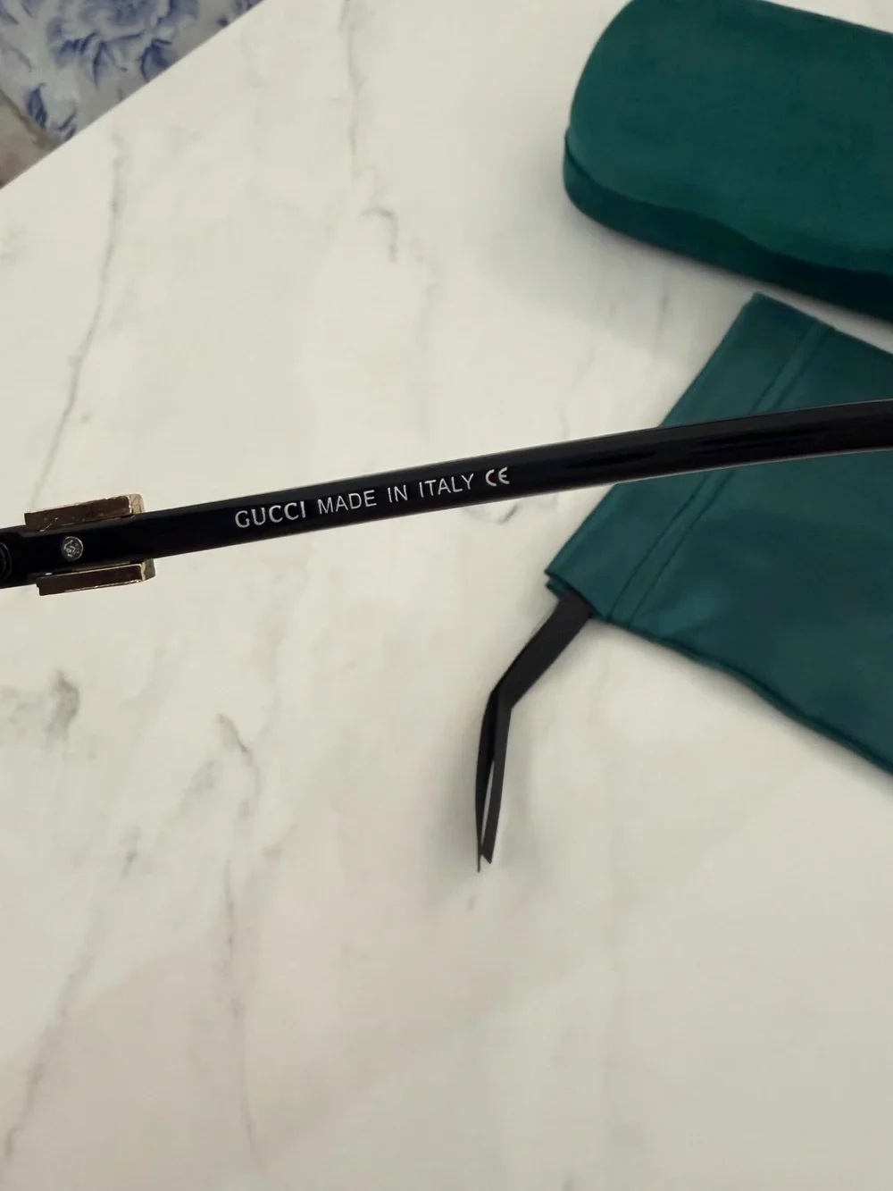 Gucci Black Oval Women's Sunglasses with Dark Lenses
